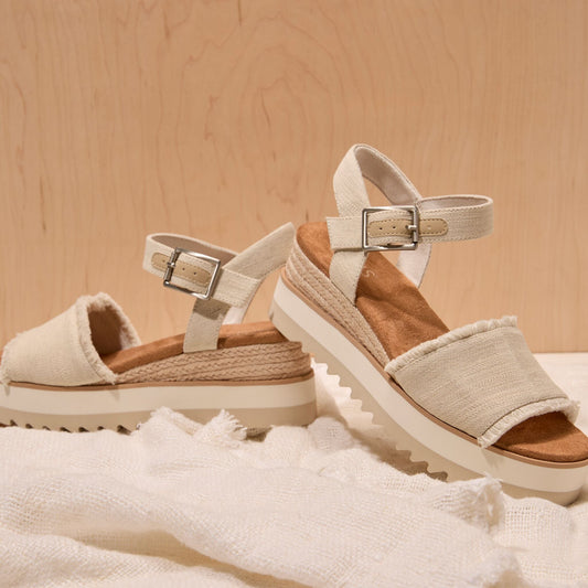 Laydown image of the frayed Diana wedge sandal