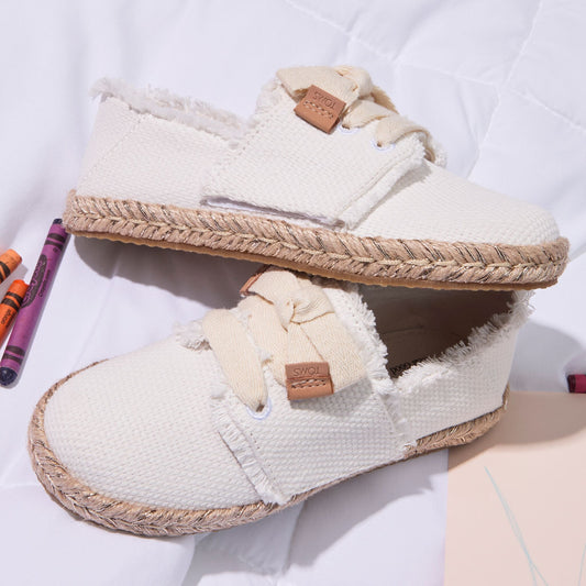 Laydown image of the youth white Carolina lace up espadrille