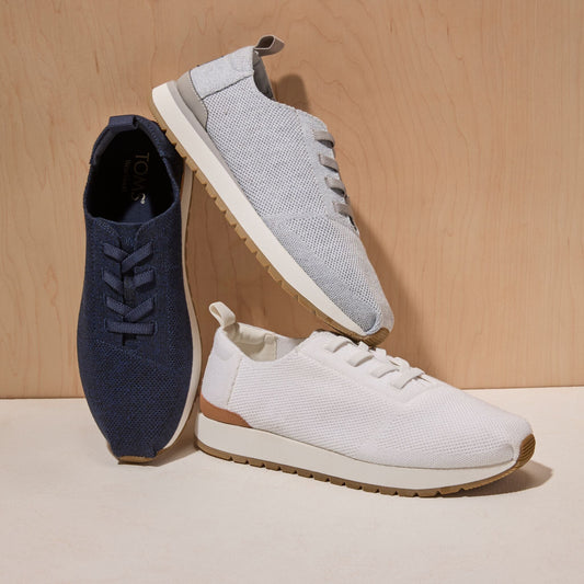 Laydown image featuring the white knit Resident Plus Lace Up