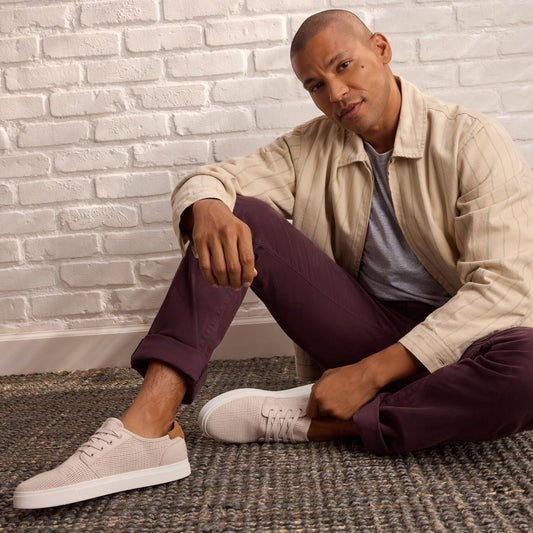 On model image of the taupe mesh Carlo 2.0 sneaker