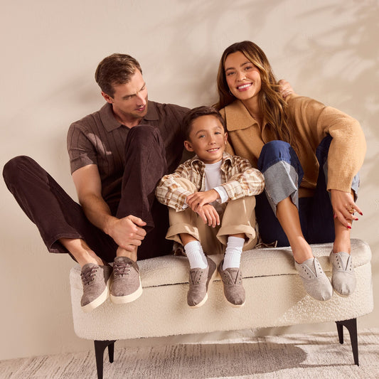 On model image of the Womens Cordones Plus Sneaker Light Grey Heritage Herringbone with family matching styles