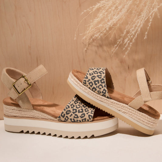 Laydown image featuring the Leopard Diana sandal featured with the matching Kids Diana Sandal