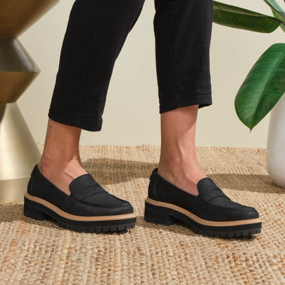 Best Selling Cara Black Leather Loafer On Model Up Close Detail Shot