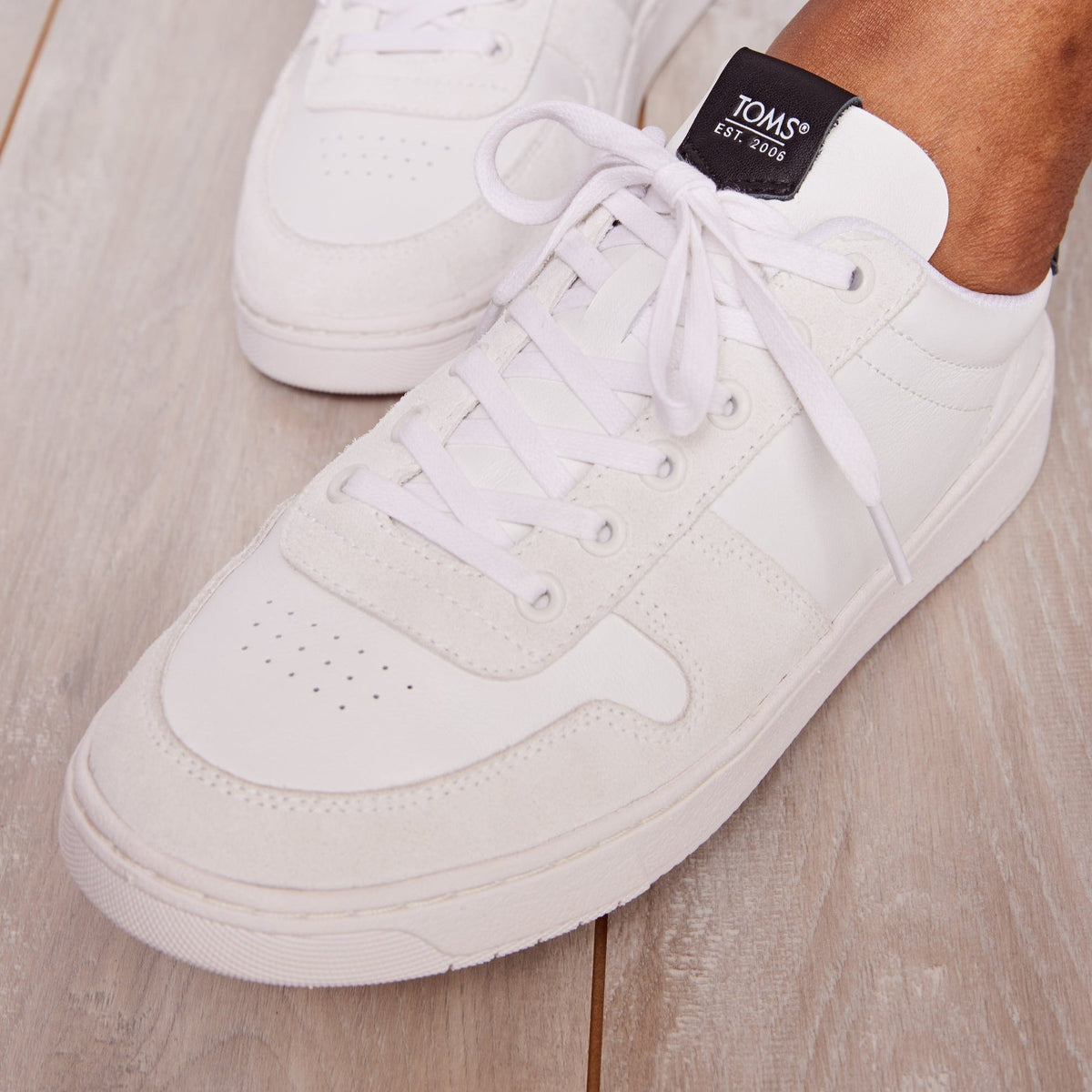 White Leather Court Lace Up Sneaker On Model Up Close Extreme Detail Shot