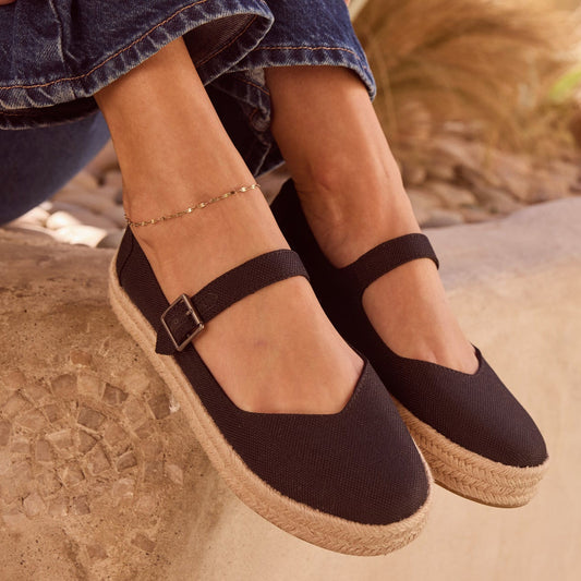On figure image of the black Carolina Mary Jane espadrille