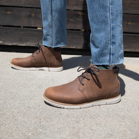 navi water resistant boot in brown on model up close detail shot