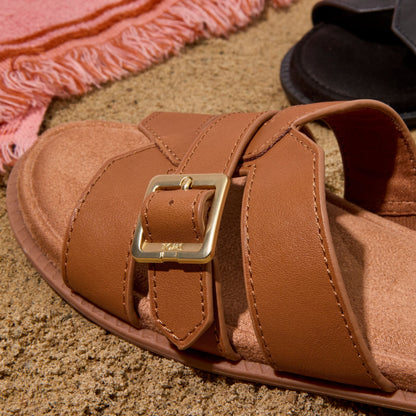 Up close detail image of the brown sugar Sol slide sandal