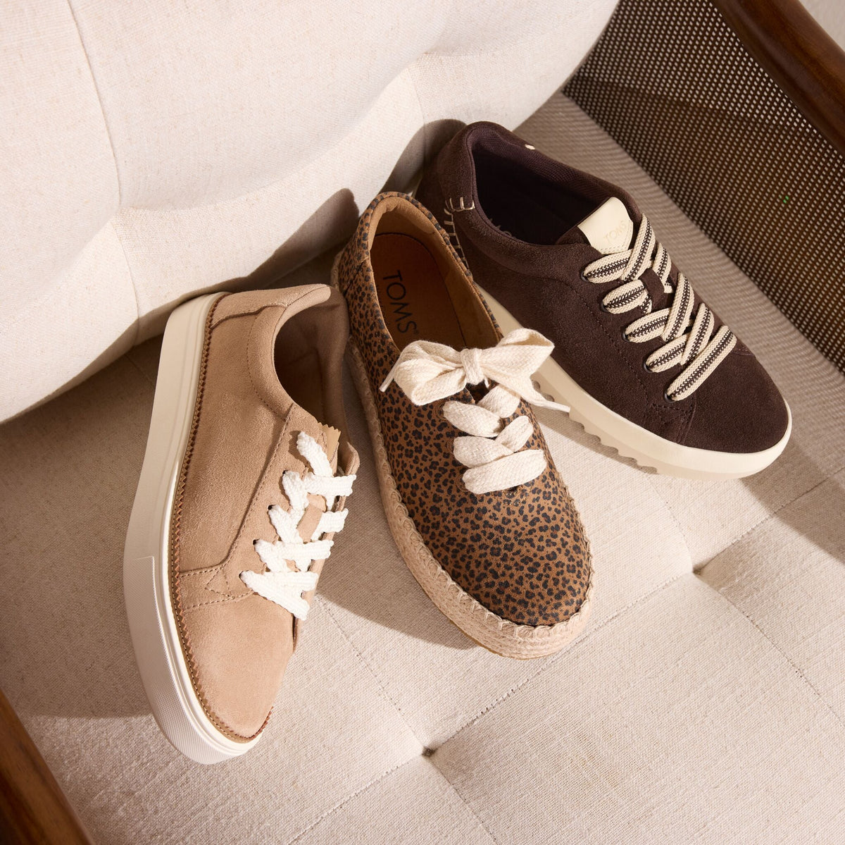 Laydown image of the Womens Izzy Lace-Up Sneaker in Taupe, leopard lace up Valencia and chocolate suede Rea sneaker